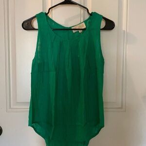 Sleeveless green top